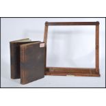 A vintage 20th Century concertina photograph album having a leatherette cover and gilt edges,