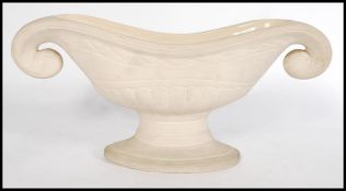 A vintage 20th century cream glazed pottery plant vase, by florist and designer Constance Spry for