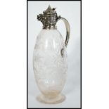 A fantastic 19th century silver hallmarked claret jug raised on a circular base with bulbous body.