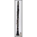 A Rene Duval cased ebonised clarinet, with nickel plated keys and mounts, stamped Rene Duval, in