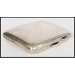 A silver hallmarked cigarette case along with a boxed pair of silver hallmarked Victorian napkin