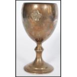 A vintage 20th century silver hallmarked goblet wine cup raised on stepped circular base. Applied