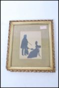 A late Victorian silhouette of a man and woman set within a gilt carved wood and gesso frame. 31cm-