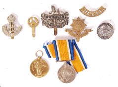 ASSORTED WWI FIRST WORLD WAR MILITARIA - MEDALS & BADGES