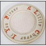 A large 19th Century porcelain Parian Ware cheese plate, the plate with hand painted notation in