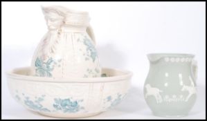 A group of ceramics to include a late 19th century Victorian wash jug and bowl having blue floral