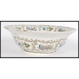 A large 19th century Staffordshire transfer printed footed bowl having transfer printed decoration