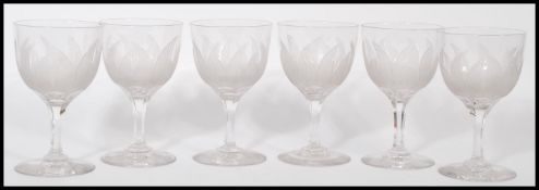 A set of 6 French 20th century cut - acid etched wine glasses. Each bowl with decorated