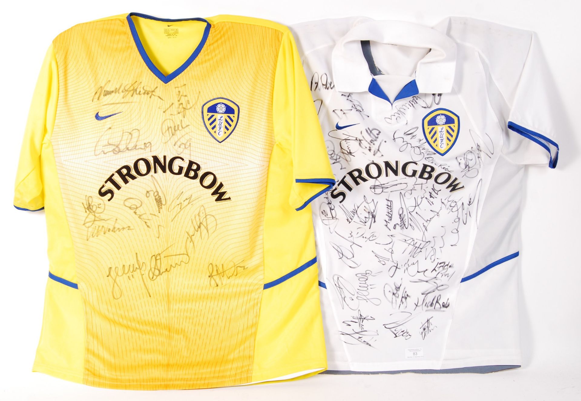 LEEDS FOOTBALL CLUB - PAIR OF HOME & AWAY AUTOGRAPHED SHIRTS