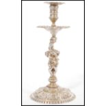 A 19th century Victorian hallmarked silver candlestick raised on circular base with figural cherub