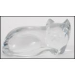 A vintage 20th century Val St Lambert clear glass figurine of a cat being signed by artist to