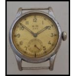 A vintage 20th century WW2 Second World War KM Kriegsmarine watch. Steel case with stamped serial