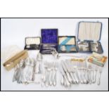 A collection of vintage flatware to include a cased set of 800 silver spoons, various German