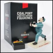 A Coalport advertising figurine Guinness Zookeeper 10/1200 complete in original box with pin