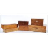 A selection of wooden desk boxes to include a 19th Century oak writing slope having a red velvet