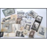 A collection of postcards and photographs dating from the early 20th century to include various