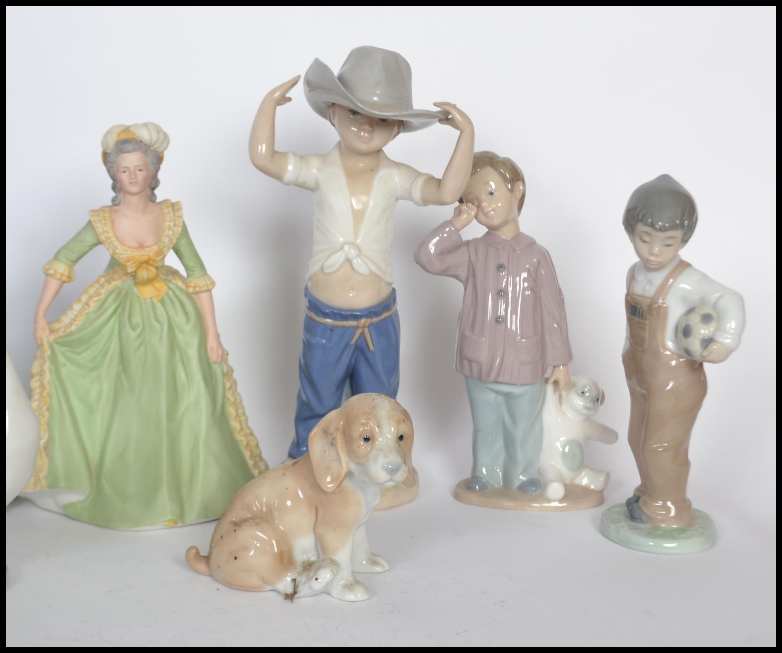A selection of nao ceramic figurines to include a boy and teddy bear figurine, a boy in a cowboy - Image 4 of 6
