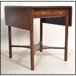 A 19th century George III drop leaf square sofa table  desk. Raised on unusual turned legs with