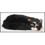 An 'Able Seaman Simon Hero of HMS Amethyst' replica cat made from rabbit fur, having a description