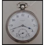 A hallmarked silver early 20th century pocket watch by Dennison having a white enamel face with