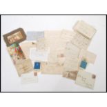 A group of antique letters and enveloped dating from the mid 18th century some with early stamps.