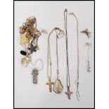 A collection of silver and non silver necklaces and pendants to include crucifix cross on rope twist