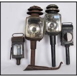 A group of vintage lights to include a pair of antique carriage lamps with glazed panels along
