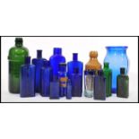 A collection of 19th Century Victorian apothecary / shop bottles to include a green glass