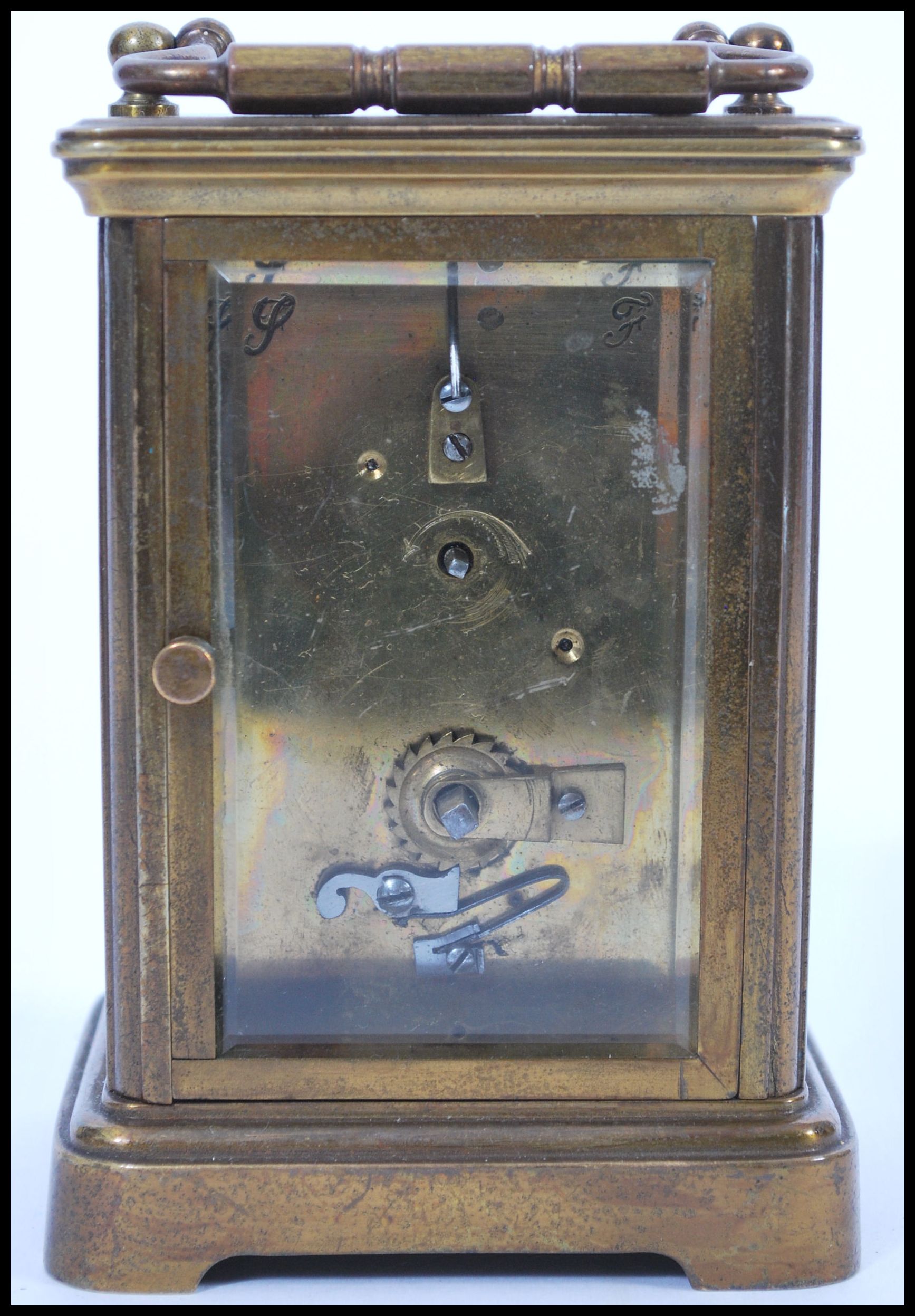 An early 20th Century brass bound carriage clock having roman numerals to the chapter ring and - Image 3 of 4