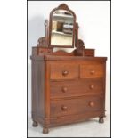 A Victorian mahogany dressing chest of drawers. Raised on a plinth base with a series of short and