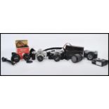 A good collection of vintage cameras, lenses and photographic equipment to include Nikon, Nikon