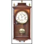 A 20th century modern Comitti of London mahogany inlaid drop dial wall clock with roman numeral