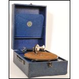 A vintage 20th century blue cased portable record player gramophone by Antonia having hinged lid