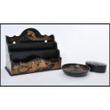 A group of three vintage early 20th century Japanese lacquer desk items to include desk tidy,