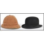 Two vintage hats to include a gentleman's bowler hat by G. A. Dunn & Co Ltd, along with a J. S.
