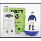 A Royal Doulton ceramic advertising figurine of a Subbuteo player in blue and white kit. MCL12 142/