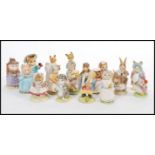 A selection of Beswick Beatrix Potter ceramic figurines to include 'Jemima Puddleduck', 'Miss