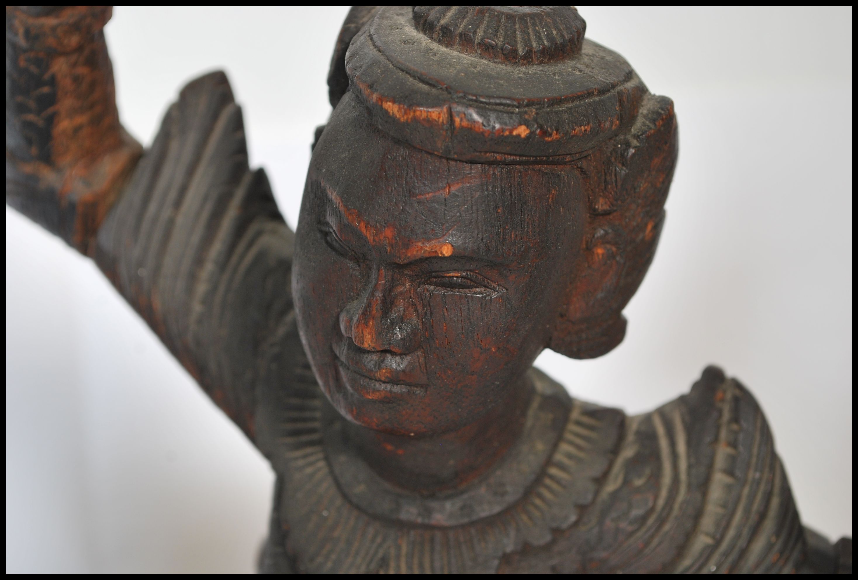 A pair of early 20th century Chinese / Asiatic wooden hand carved figurines of Buddhas / deities - Image 3 of 4