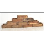 SET OF 10 MID CENTURY STACKING WOODEN INDUSTRIAL BRICK MOULDS