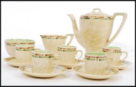 A vintage early 20th century Art Deco coffee service by Myott and Son consisting of tall coffee