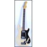 A vintage 1960's Hofner six string electric guitar having a white / cream vinyl body with black