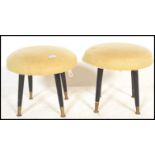 A pair of mid century retro vintage ottoman stools. Each with wool circular roundel stuffed seats