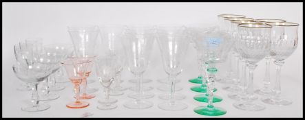 A collection of fine quality crystal glass glassware wine glasses to include uranium part