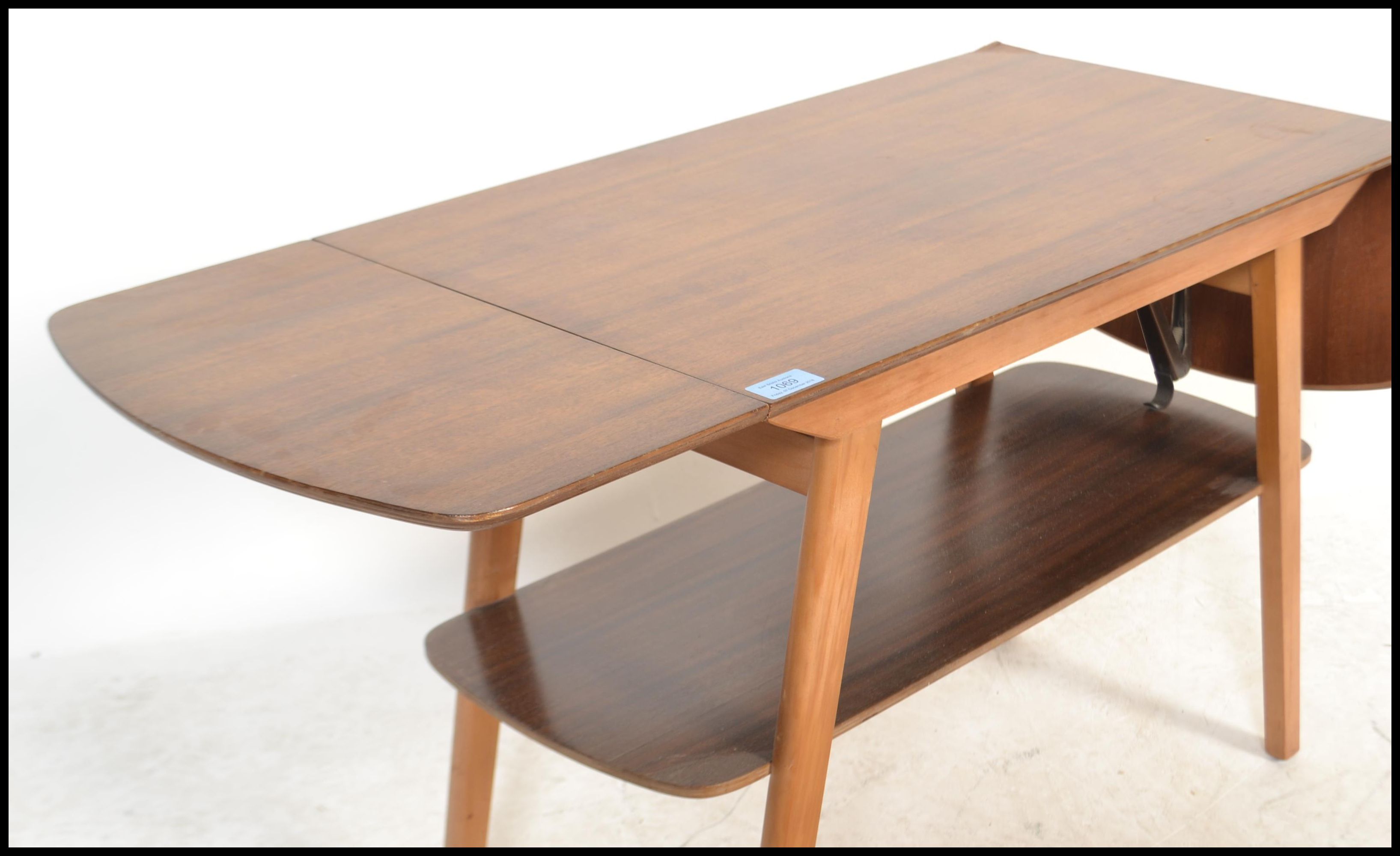 A vintage retro 20th Century double drop flap coffee table, raised on splayed tapering supports - Image 4 of 4
