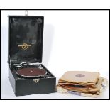 A vintage 20th century portable record player gramophone by Columbia having hinged lid with fitted