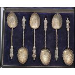 A set of six 19th century Victorian hallmarked silver Apostle teaspoons / tea spoons. Scalloped