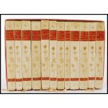 A set of 12 sleeved late Victorian poetry books entitled 'The Poetical Works of Alfred Lord