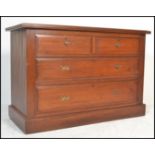 An early 20th century Edwardian mahogany cottage chest of drawers. The bank of two over three