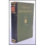 A 1920's edition of 'Stielers Hand-Atlas' published in 1926 by Gotcha: Justus Perthes. A hard backed