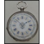 A 19th century Victorian hallmarked silver ladies pocket watch having a white enamel face with